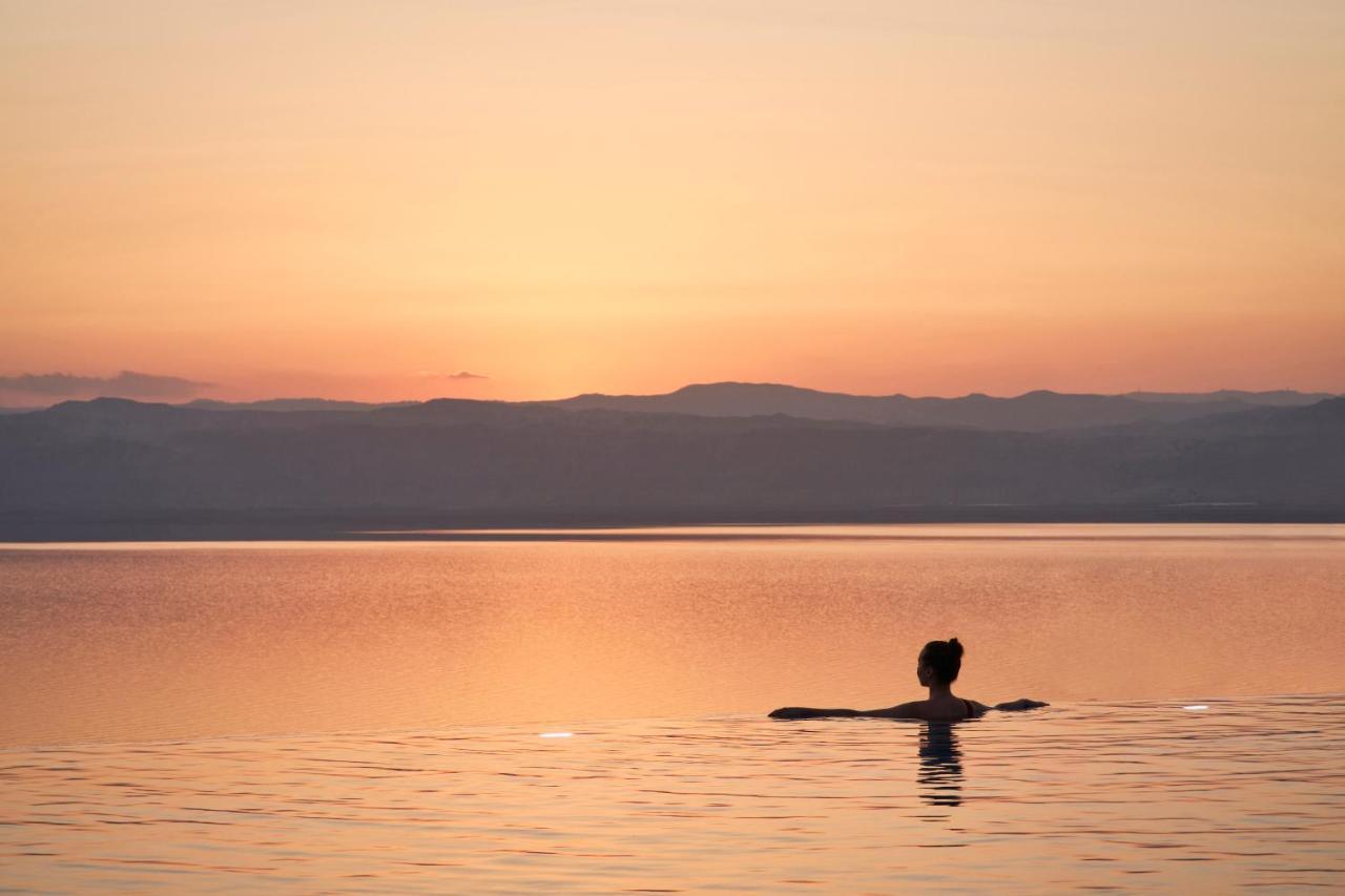 Moevenpick Resort & Spa Dead Sea Sweimeh Exterior photo Sunset over the Dead Sea